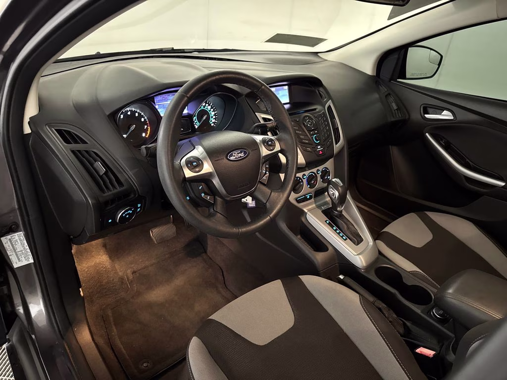 2012 Sterling Gray Metallic Ford Focus SE FWD Hatchback