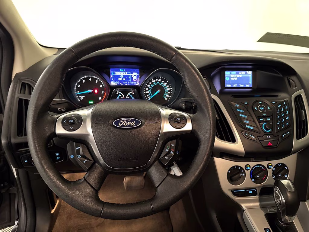 2012 Sterling Gray Metallic Ford Focus SE FWD Hatchback