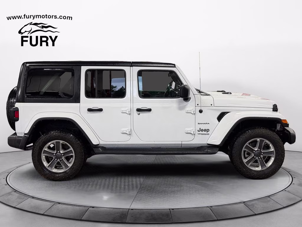 Used 2021 Jeep Wrangler Unlimited Sahara with VIN 1C4HJXEN9MW865453 for sale in Forest Lake, Minnesota