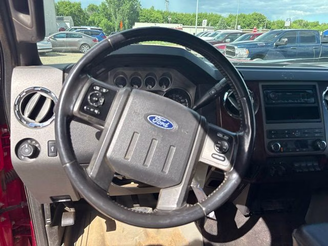 2011 Red Ford Super Duty F-250 SRW Lariat 4X4 Truck
