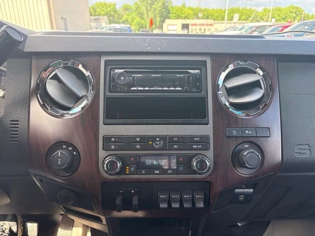 2011 Red Ford Super Duty F-250 SRW Lariat 4X4 Truck