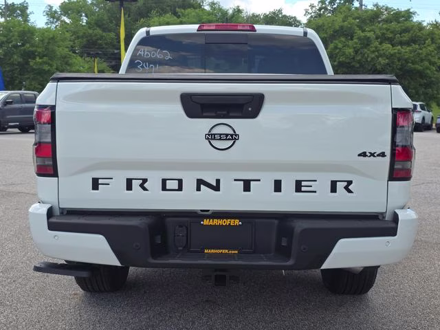 2026 Glacier White Nissan Frontier SV 4X4 Truck