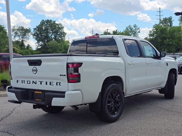 2026 Glacier White Nissan Frontier SV 4X4 Truck
