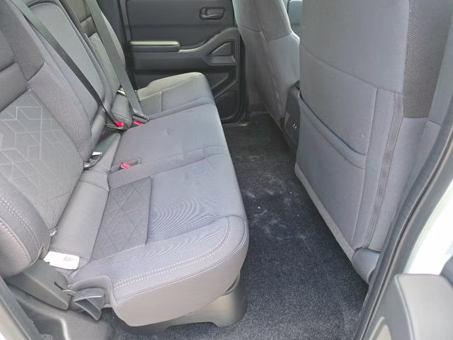 2026 Glacier White Nissan Frontier SV 4X4 Truck