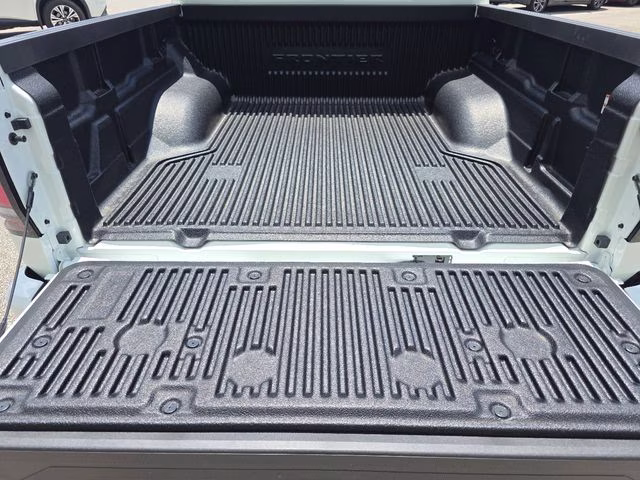 2026 Glacier White Nissan Frontier SV 4X4 Truck