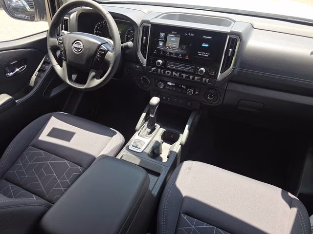 2026 Glacier White Nissan Frontier SV 4X4 Truck