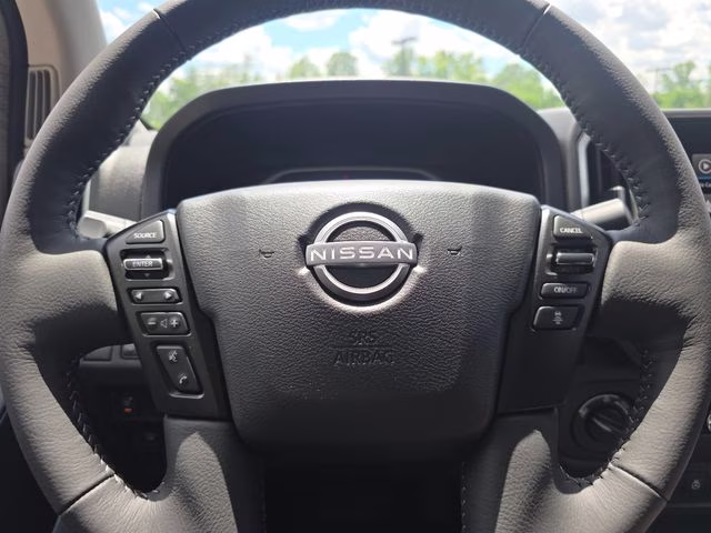 2026 Glacier White Nissan Frontier SV 4X4 Truck