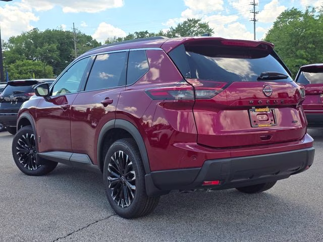 2026 Scarlet Ember Tintcoat Nissan Rogue Dark Armor AWD SUV