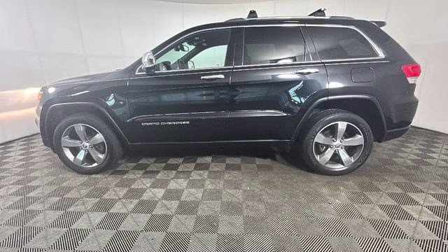 2015 Brilliant Black Crystal Pearlcoat Jeep Grand Cherokee Limited 4X4 SUV