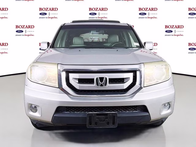 Used 2010 Honda Pilot EX-L with VIN 5FNYF3H5XAB021119 for sale in St. Augustine, FL