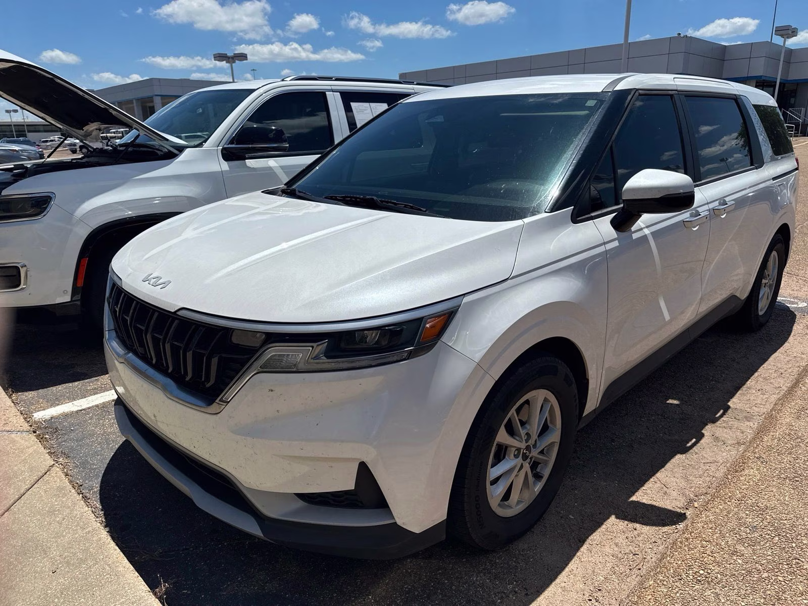 2024 Snow White Pearl Kia Carnival LX FWD Van