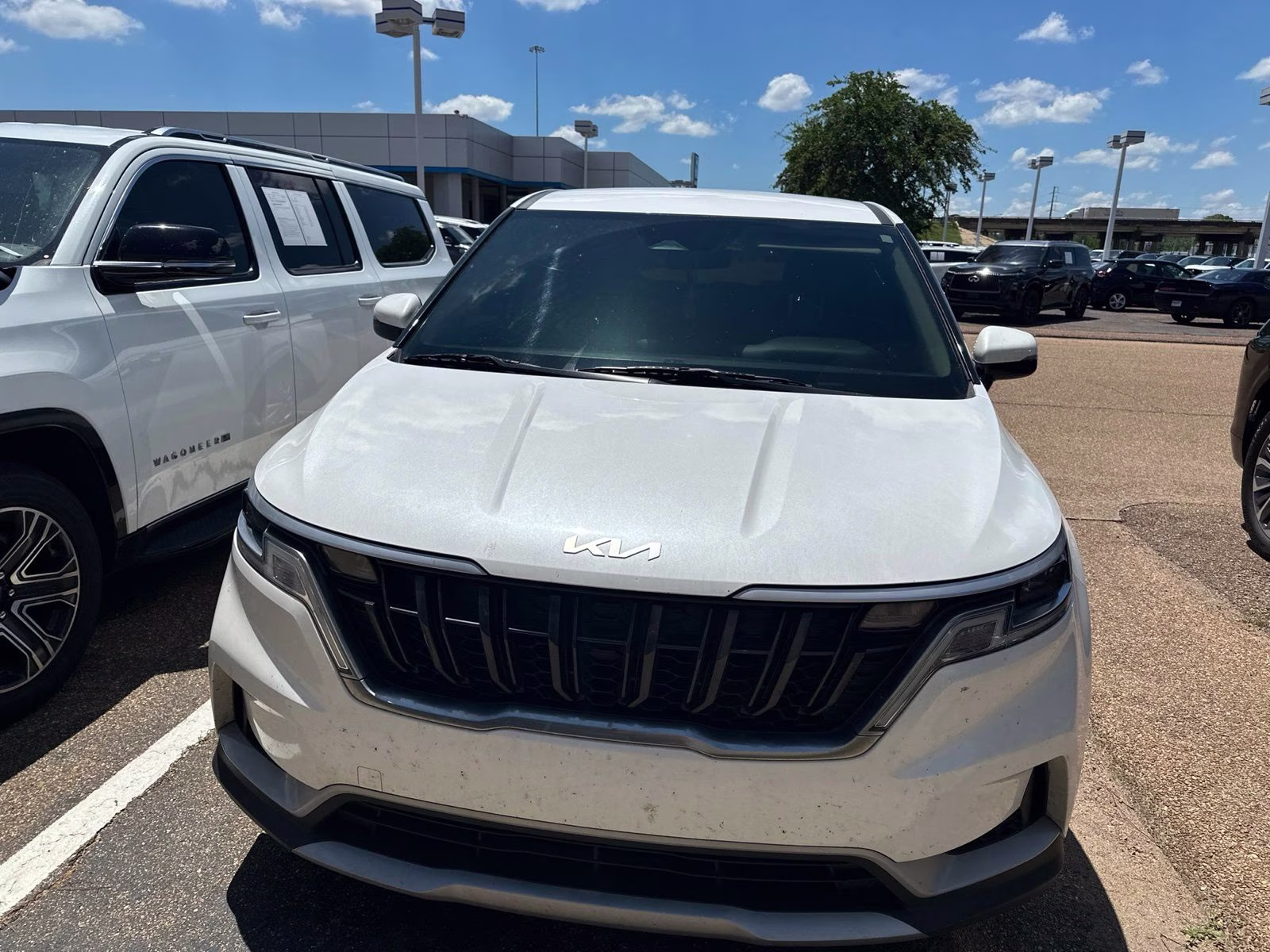 2024 Snow White Pearl Kia Carnival LX FWD Van