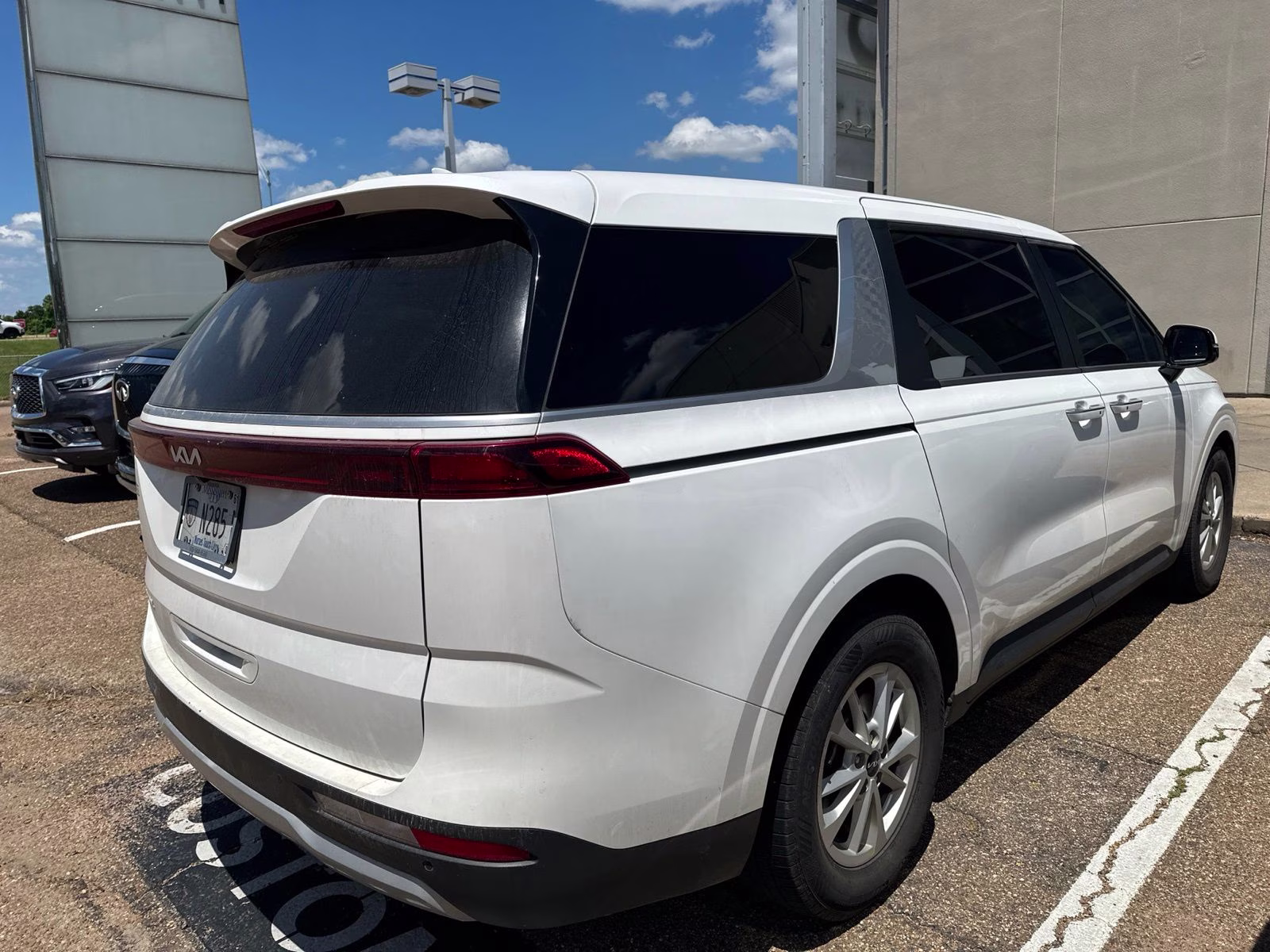 2024 Snow White Pearl Kia Carnival LX FWD Van