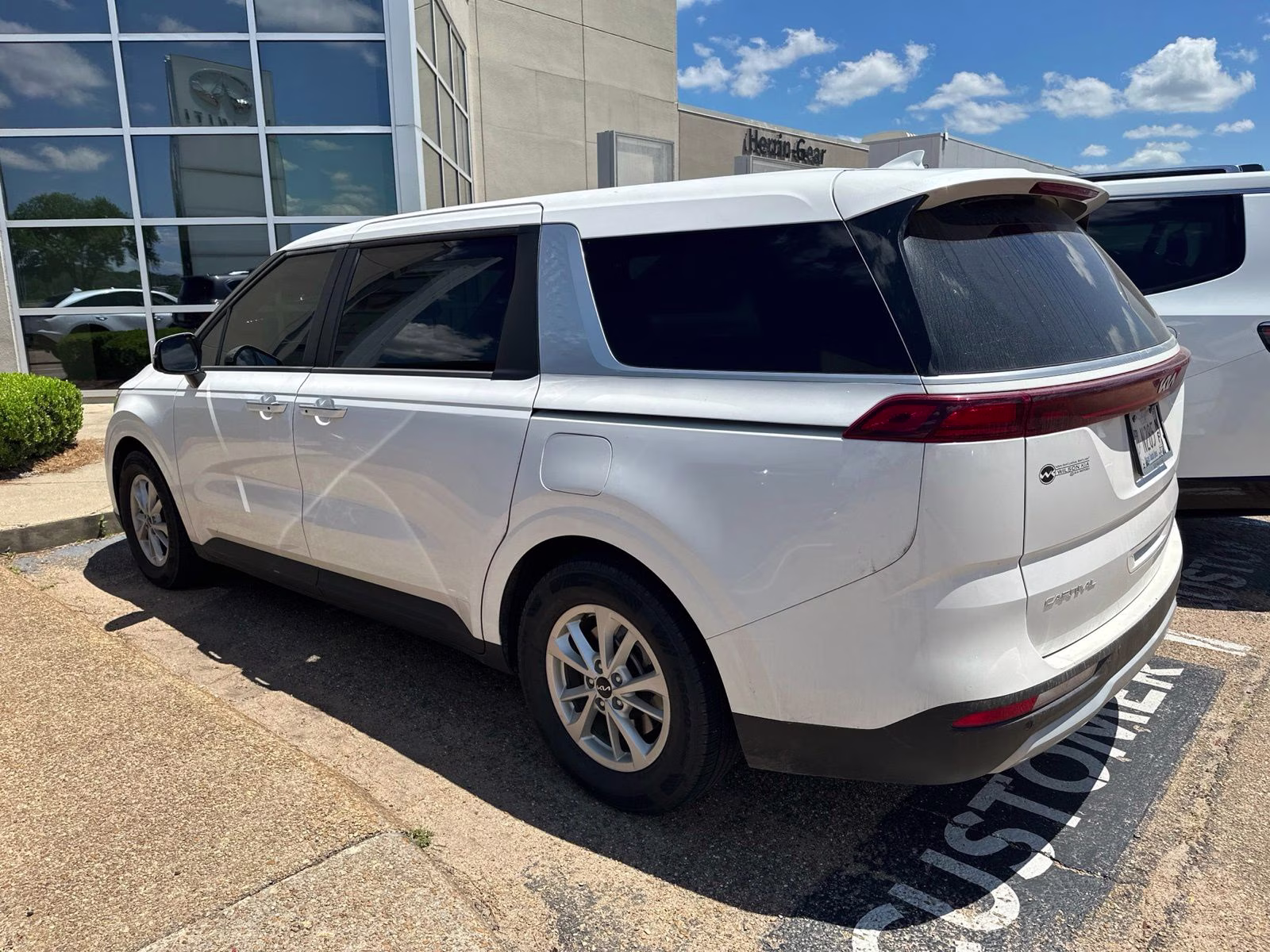 2024 Snow White Pearl Kia Carnival LX FWD Van
