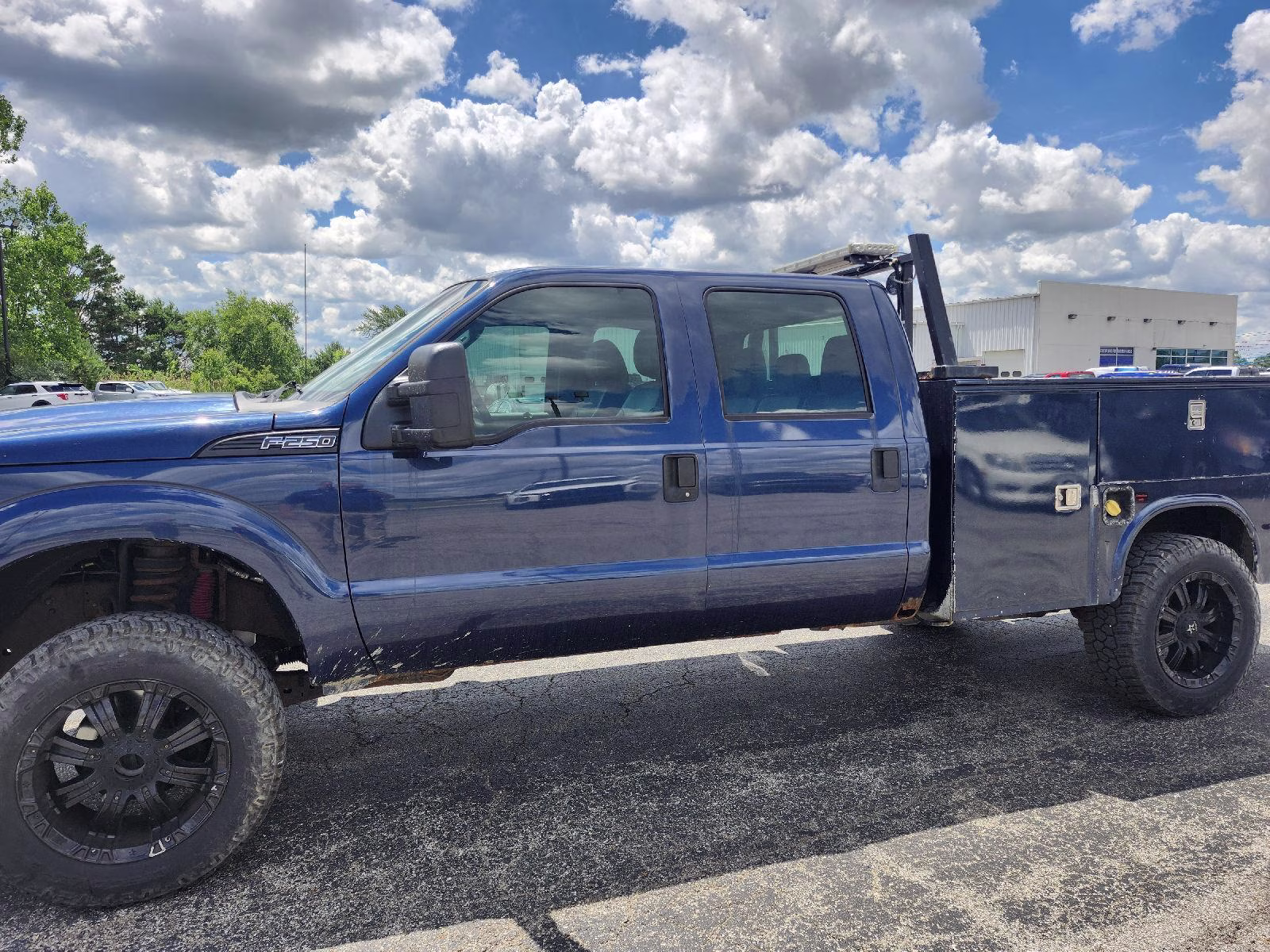 2013 Blue Jeans Metallic Ford Super Duty F-250 SRW XL 4X4 Truck