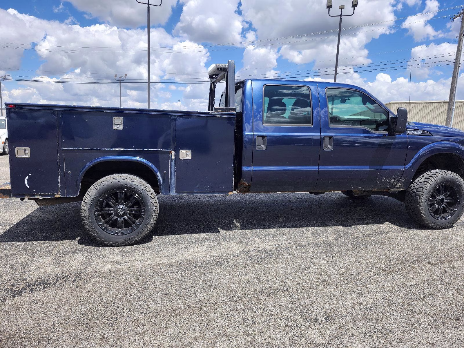 2013 Blue Jeans Metallic Ford Super Duty F-250 SRW XL 4X4 Truck