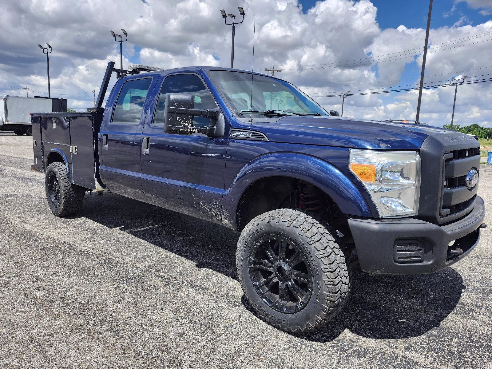 2013 Blue Jeans Metallic Ford Super Duty F-250 SRW XL 4X4 Truck