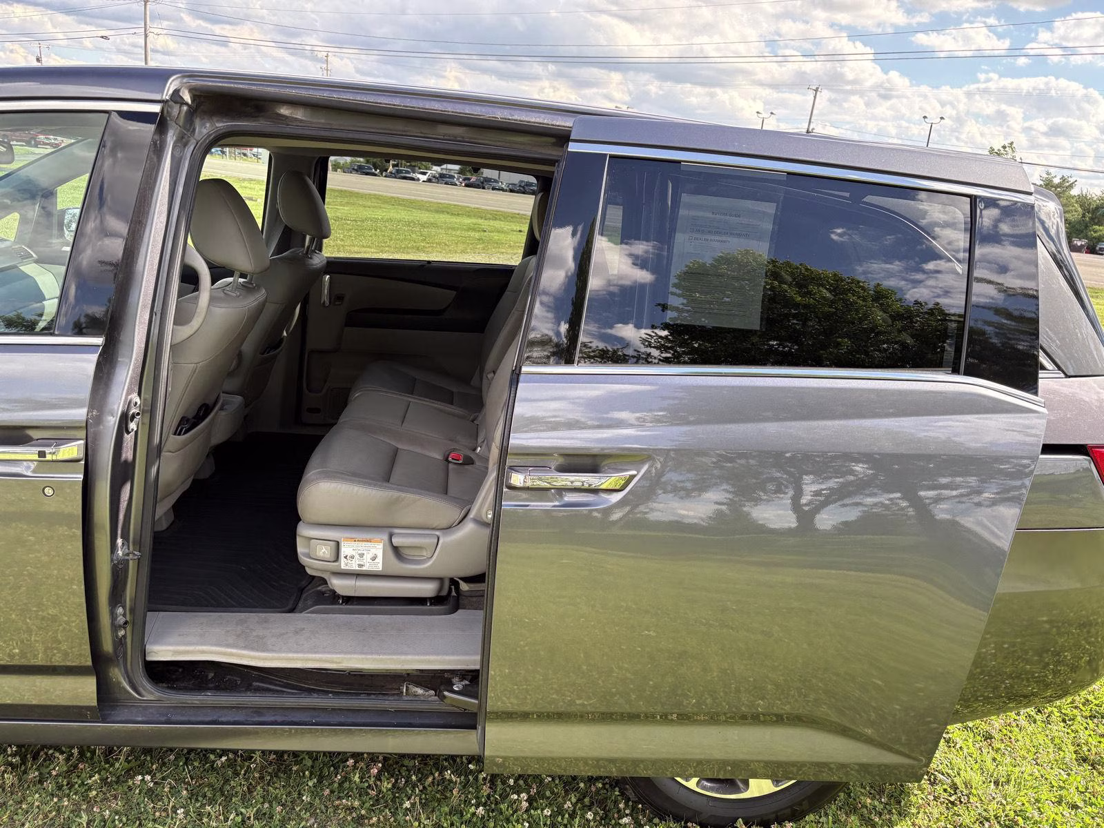 2014 Modern Steel Metallic Honda Odyssey Touring FWD Van