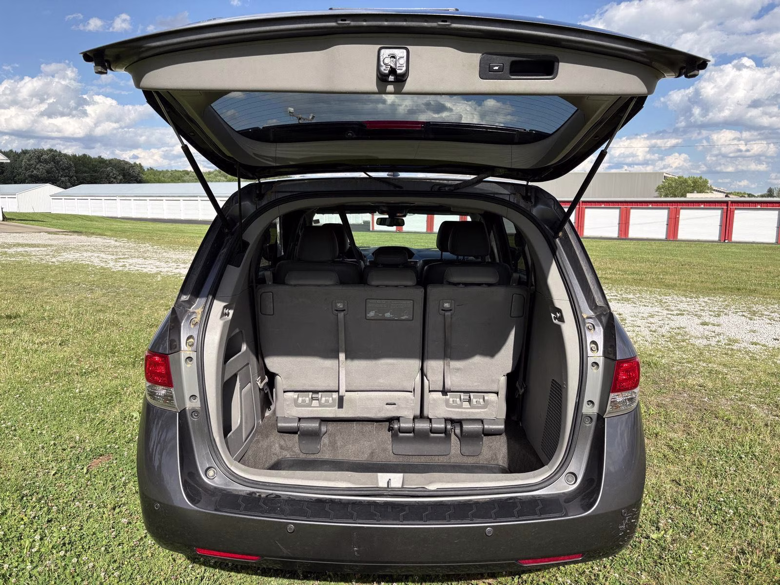 2014 Modern Steel Metallic Honda Odyssey Touring FWD Van