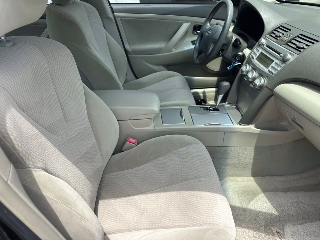 2010 Black Toyota Camry LE FWD Sedan