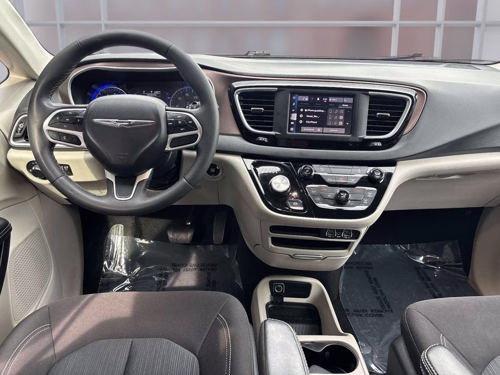 2023 Bright White Clearcoat Chrysler Voyager LX FWD Van
