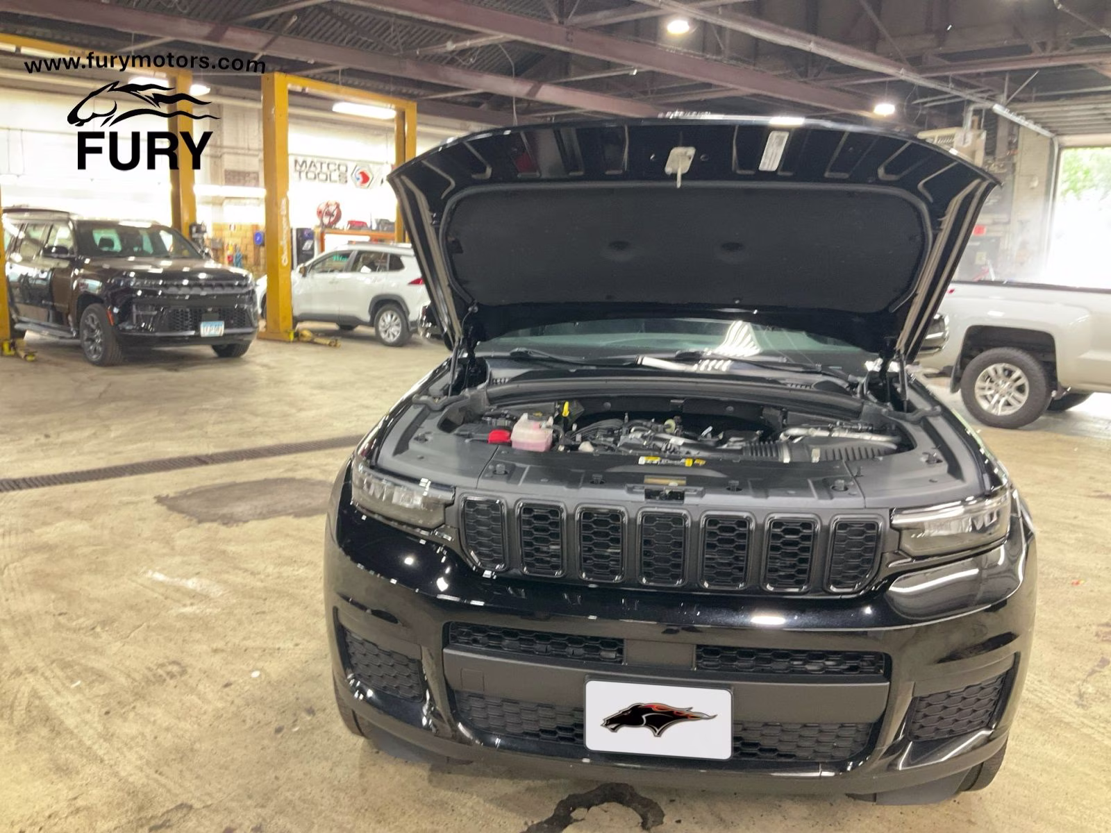 2023 Diamond Black Crystal Pearlcoat Jeep Grand Cherokee L Altitude 4X4 SUV