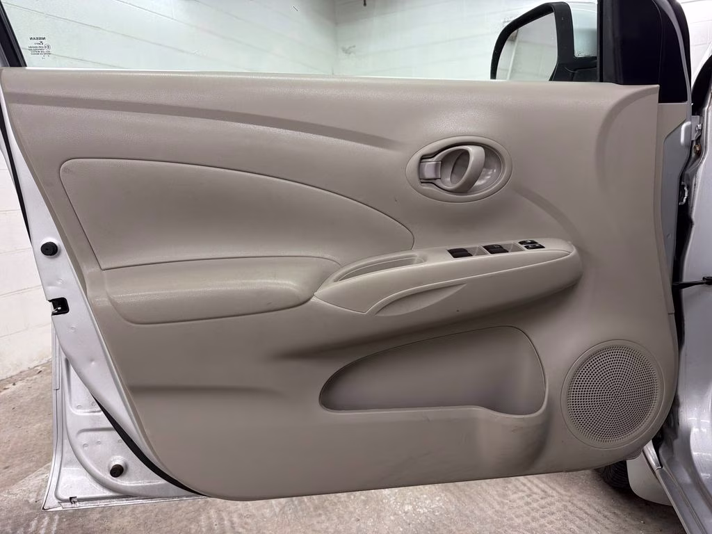 2012 Brilliant Silver Metallic Nissan Versa 1.6 SV FWD Sedan