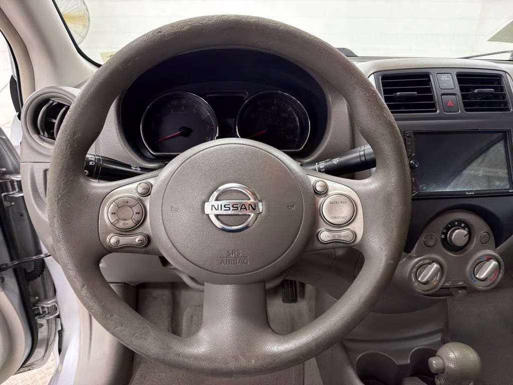 2012 Brilliant Silver Metallic Nissan Versa 1.6 SV FWD Sedan