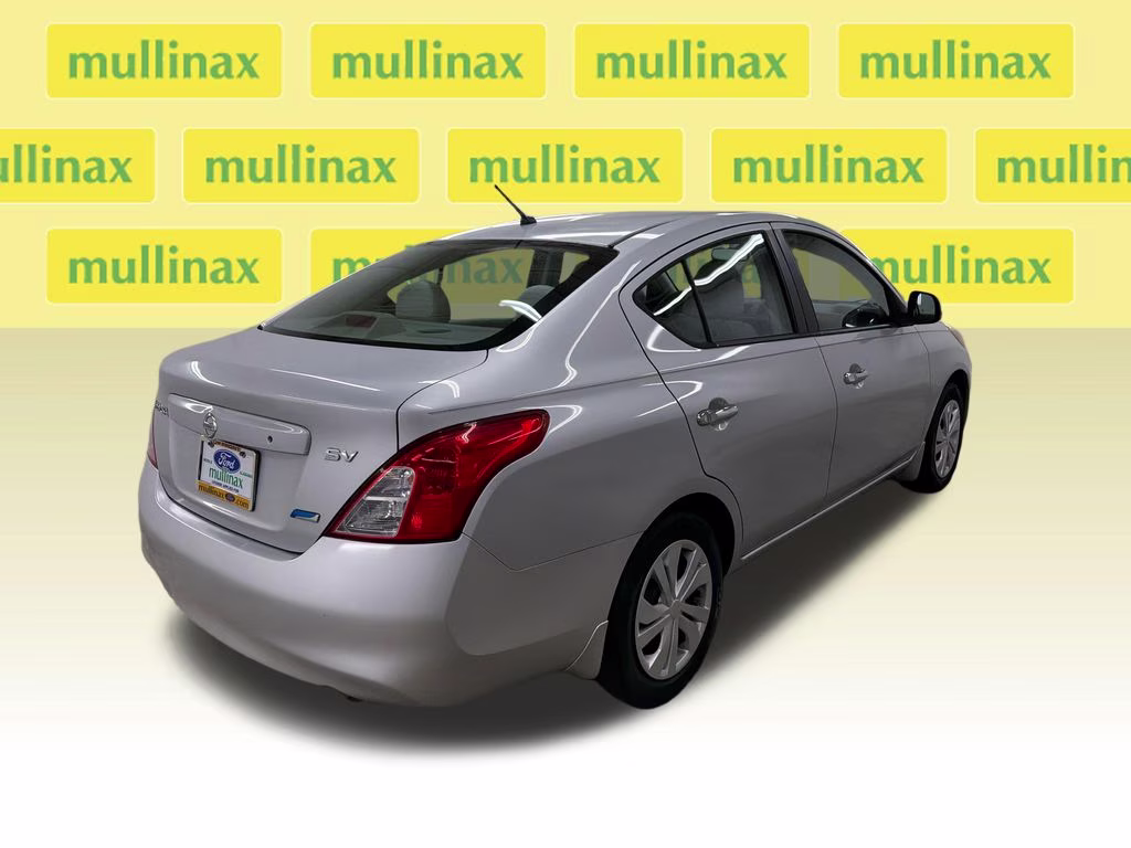 2012 Brilliant Silver Metallic Nissan Versa 1.6 SV FWD Sedan