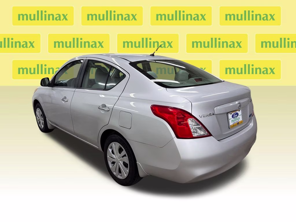 2012 Brilliant Silver Metallic Nissan Versa 1.6 SV FWD Sedan