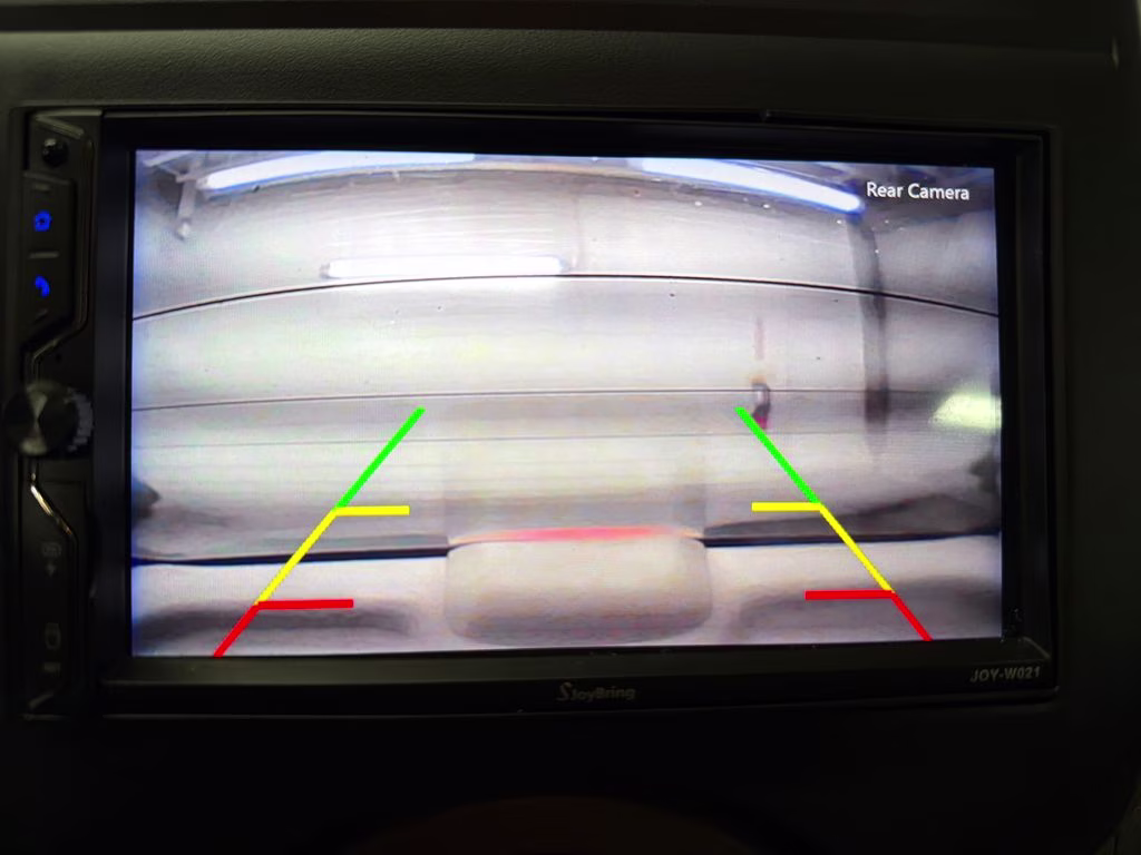 2012 Brilliant Silver Metallic Nissan Versa 1.6 SV FWD Sedan