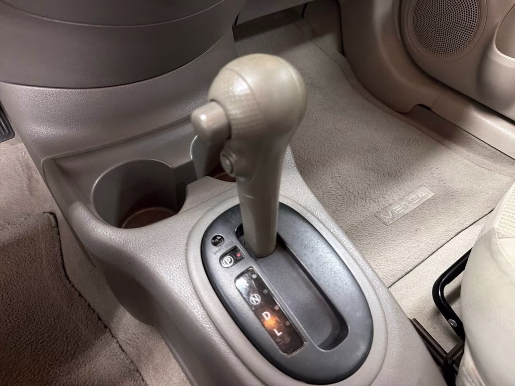 2012 Brilliant Silver Metallic Nissan Versa 1.6 SV FWD Sedan