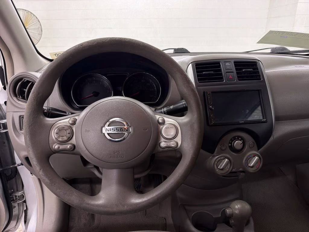 2012 Brilliant Silver Metallic Nissan Versa 1.6 SV FWD Sedan