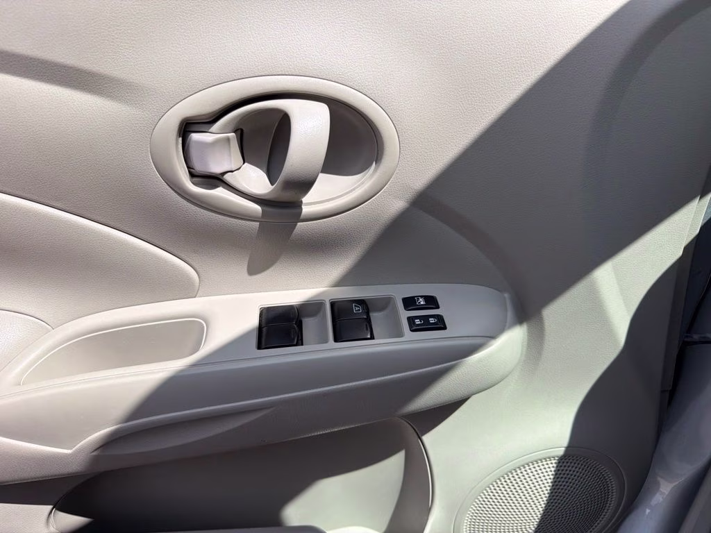2012 Brilliant Silver Metallic Nissan Versa 1.6 SV FWD Sedan