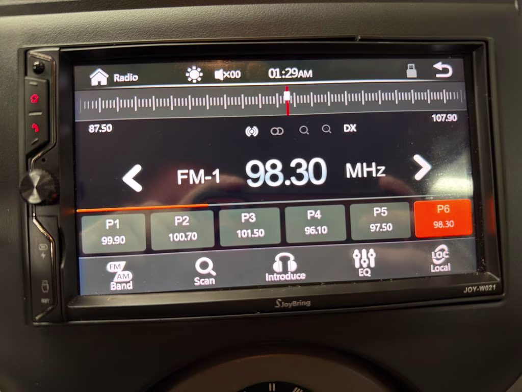 2012 Brilliant Silver Metallic Nissan Versa 1.6 SV FWD Sedan