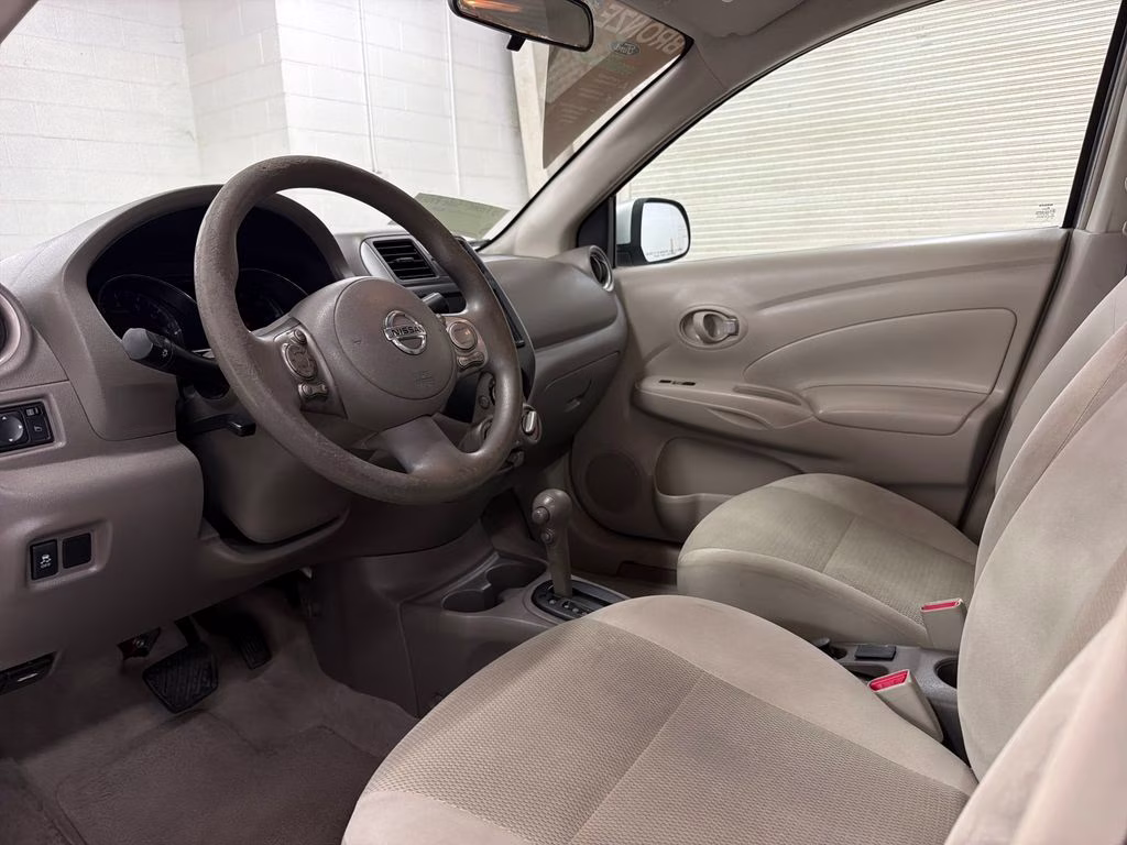 2012 Brilliant Silver Metallic Nissan Versa 1.6 SV FWD Sedan