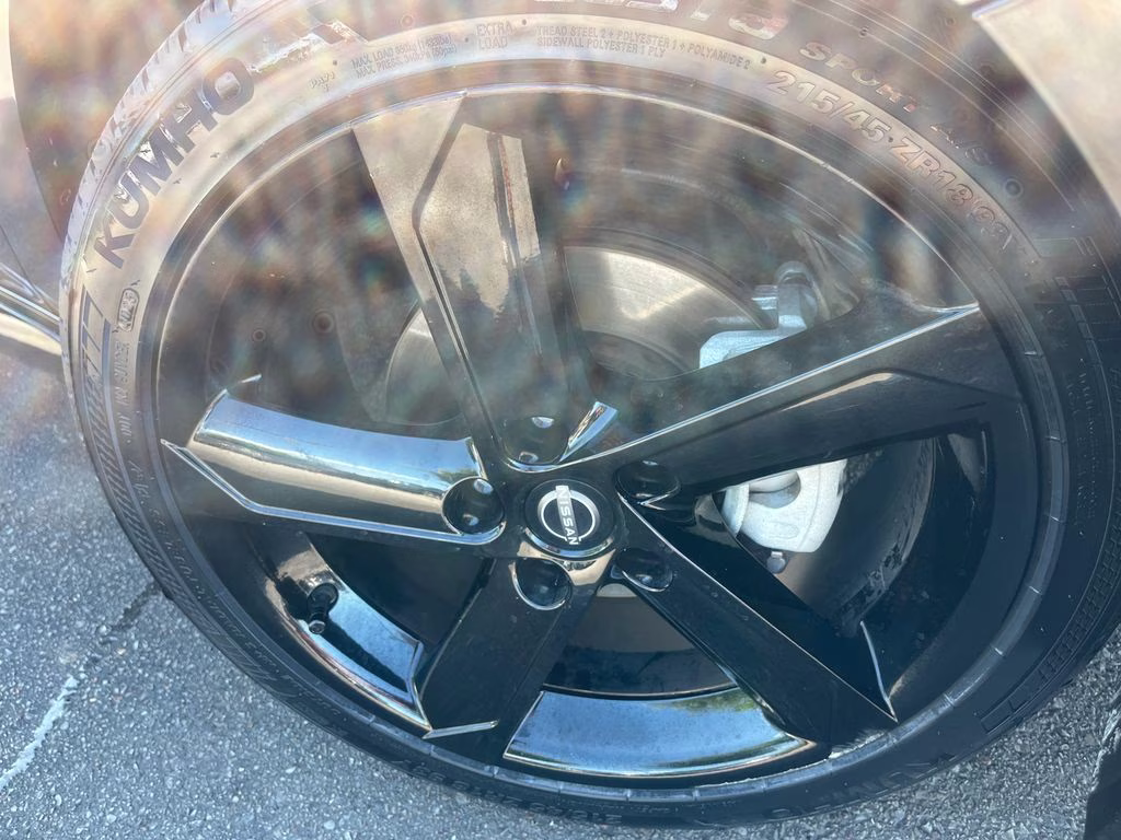 2024 Super Black Nissan Sentra SR FWD Sedan