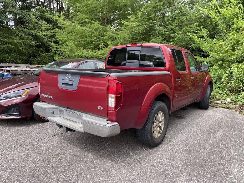 2015 Lava Red Nissan Frontier SV RWD Truck