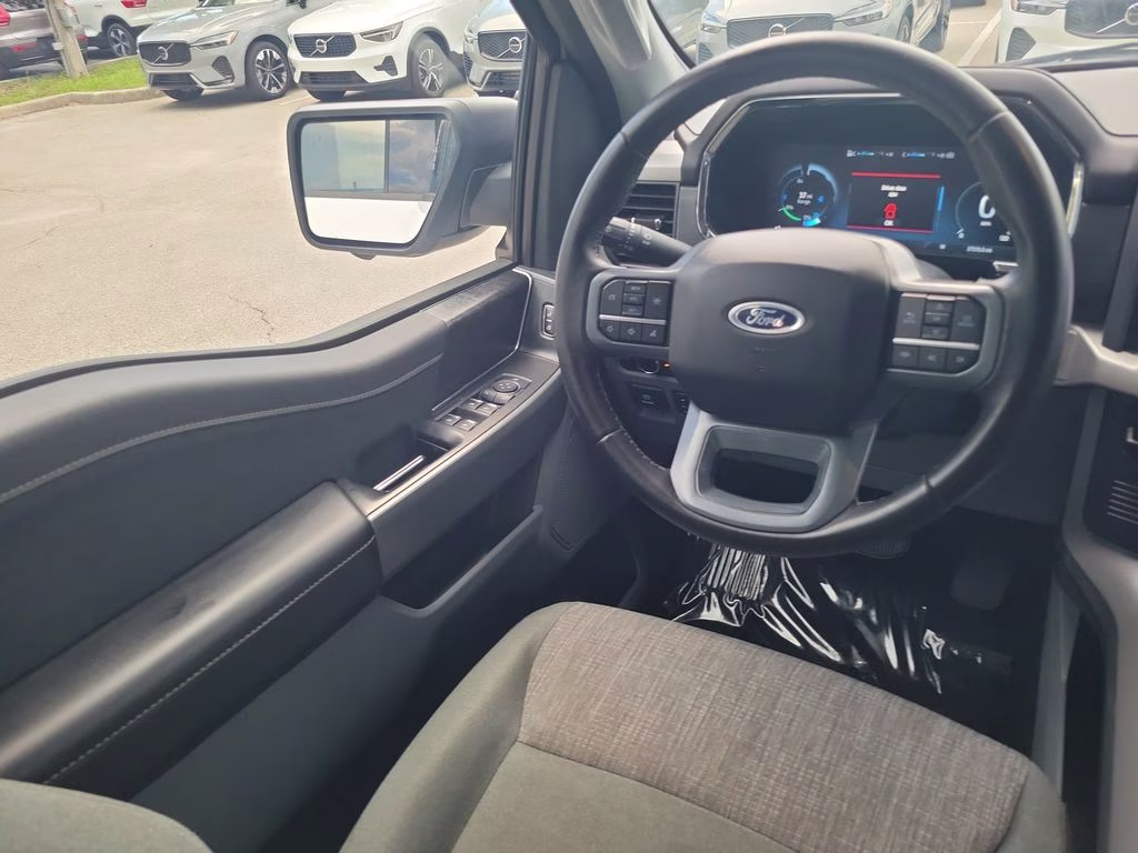 2023 Oxford White Ford F-150 Lightning XLT AWD Truck