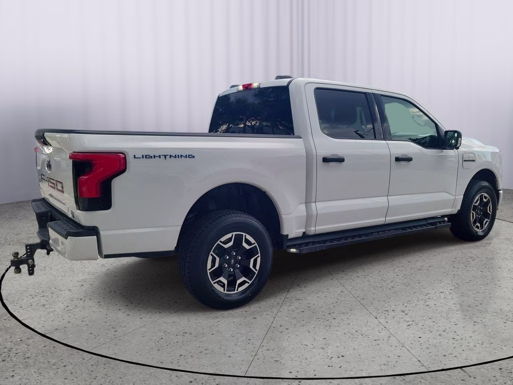 2023 Oxford White Ford F-150 Lightning XLT AWD Truck