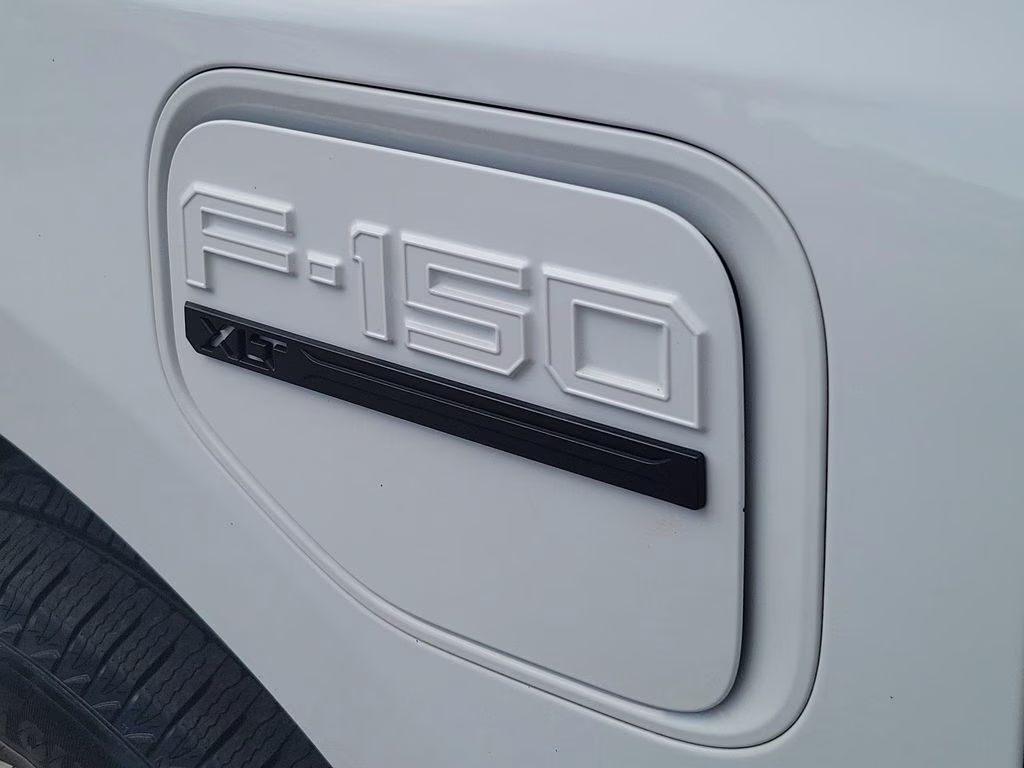 2023 Oxford White Ford F-150 Lightning XLT AWD Truck