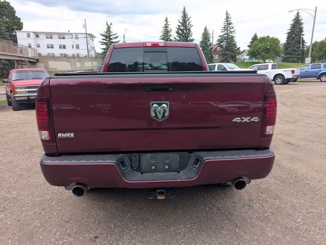 2017 Delmonico Red Pearlcoat Ram 1500 Sport 4X4 Truck