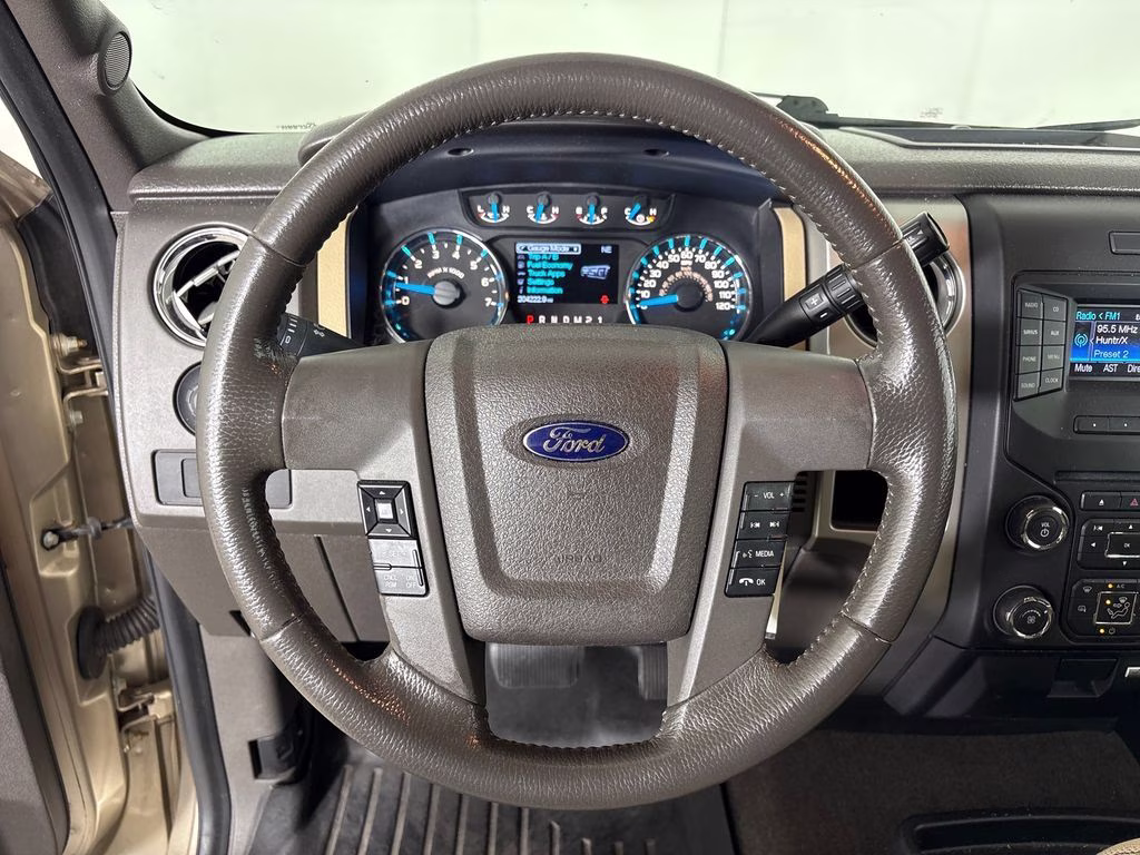 2013 Pale Adobe Metallic Ford F-150 XLT RWD Truck