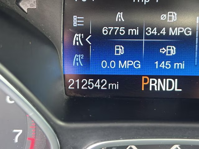 2015 Oxford White Ford Focus SE FWD Sedan
