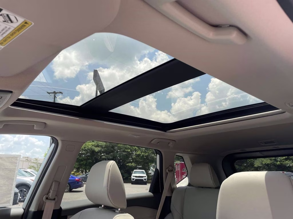 2026 Everest White Pearl Tricoat Nissan Rogue Dark Armor FWD SUV