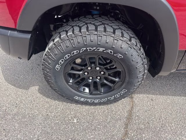 2026 Molten Red Pearlcoat Ram 1500 Rebel 4X4 Truck