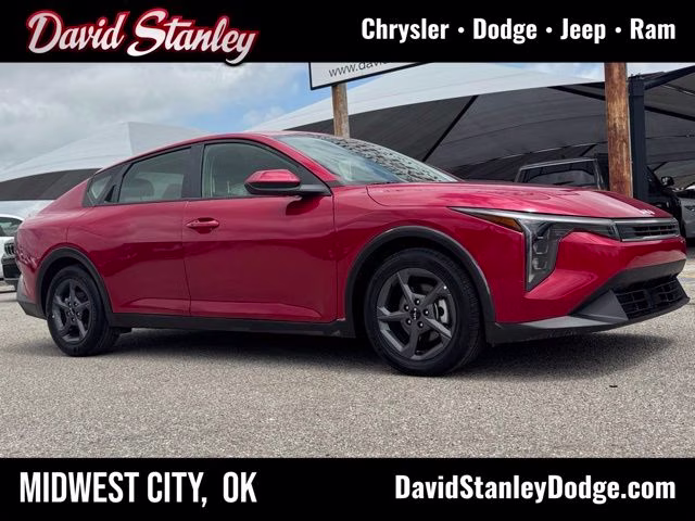 2025 Currant Red Kia K4 LXS FWD Sedan