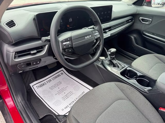 2025 Currant Red Kia K4 LXS FWD Sedan