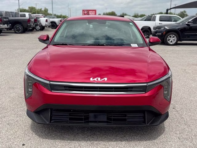 2025 Currant Red Kia K4 LXS FWD Sedan