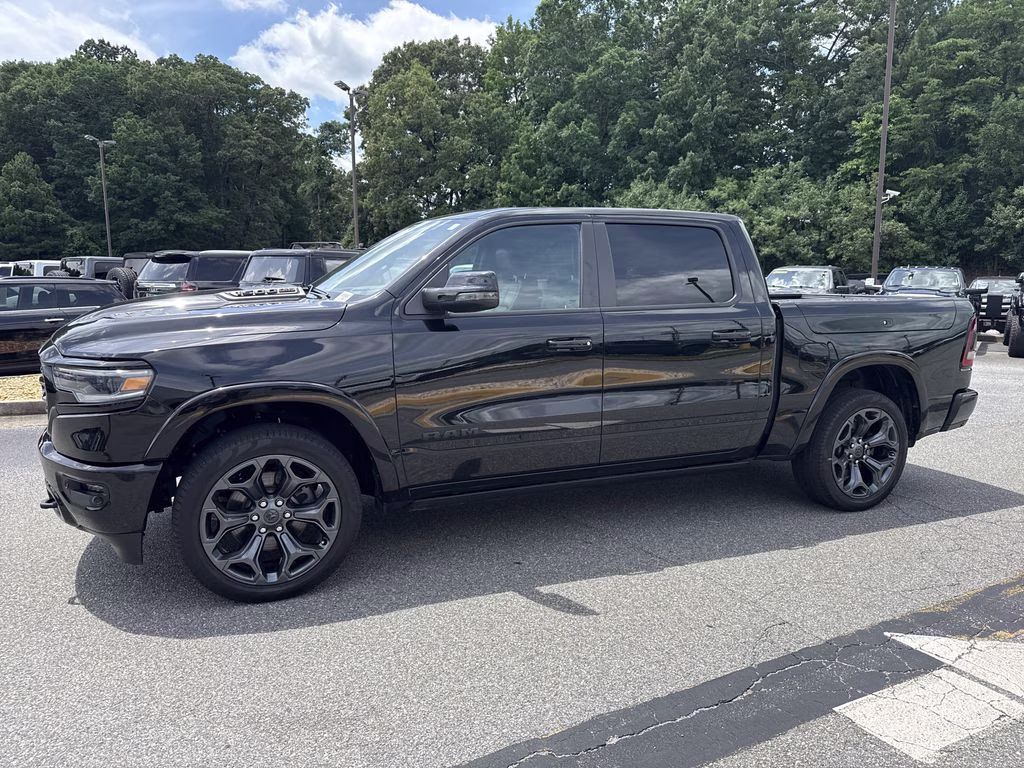 2023 Diamond Black Crystal Pearlcoat Ram 1500 Limited 4X4 Truck